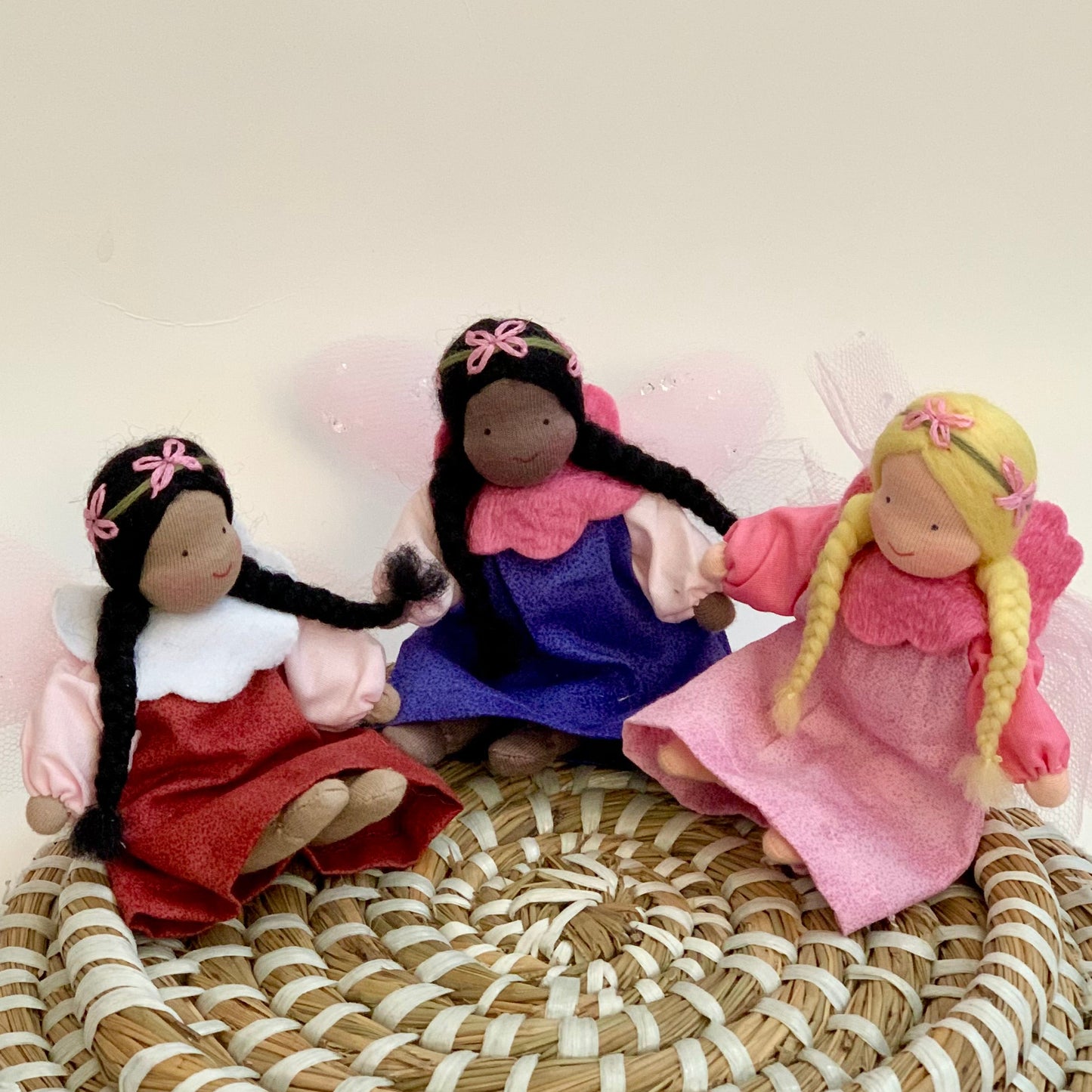 three evi waldorf fairy dolls blonde, black, and brown