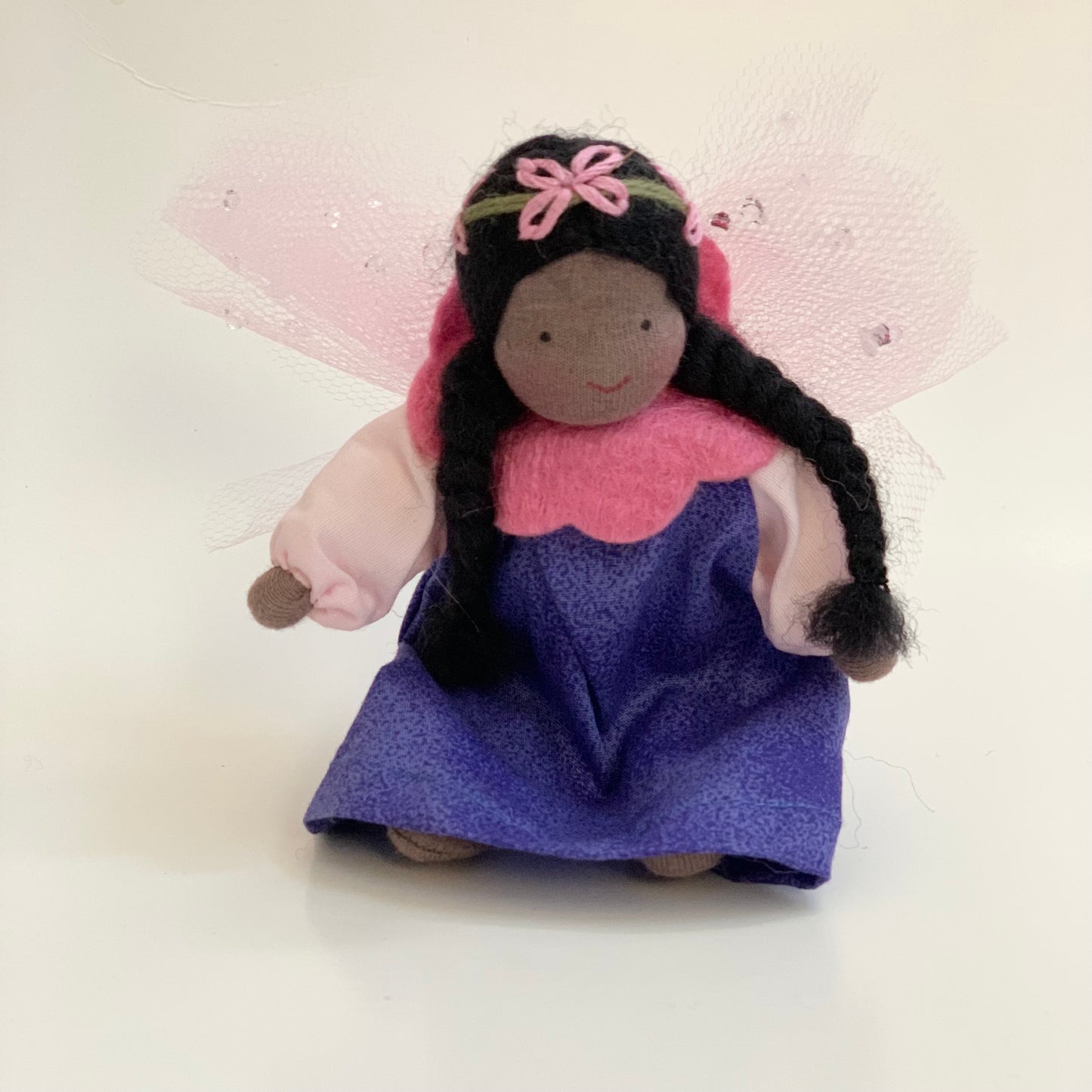 evi black garden fairy waldorf small world doll sitting