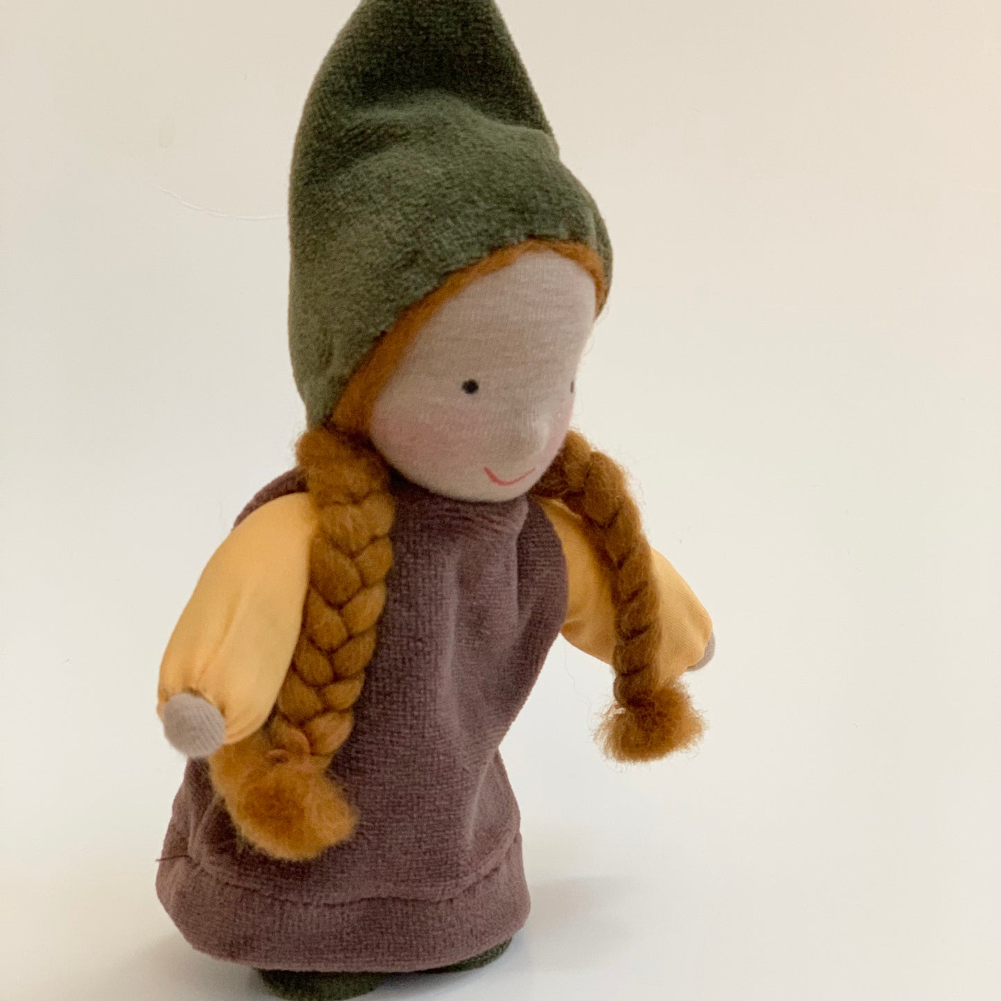 evi waldorf girl woodland gnome side view