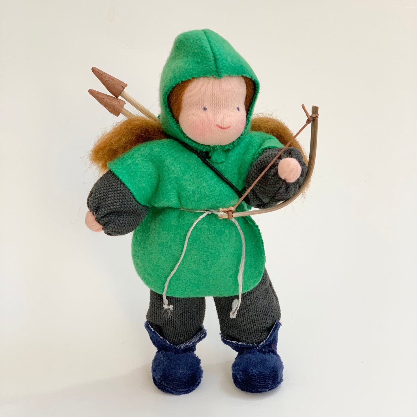 evi green archer knight waldorf doll with bow and arrows