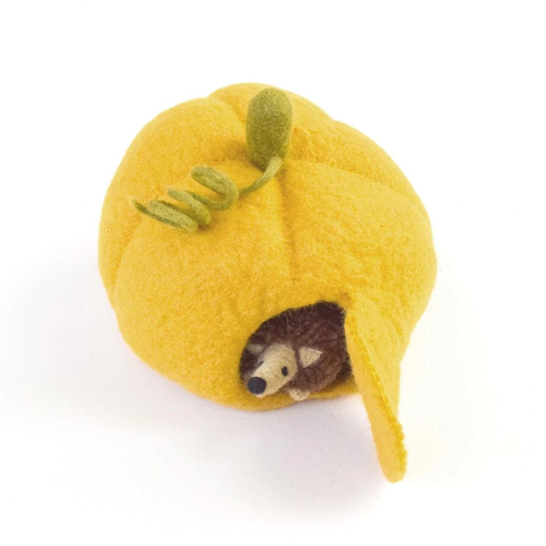 hedgehog toy in a felt pumpkin house