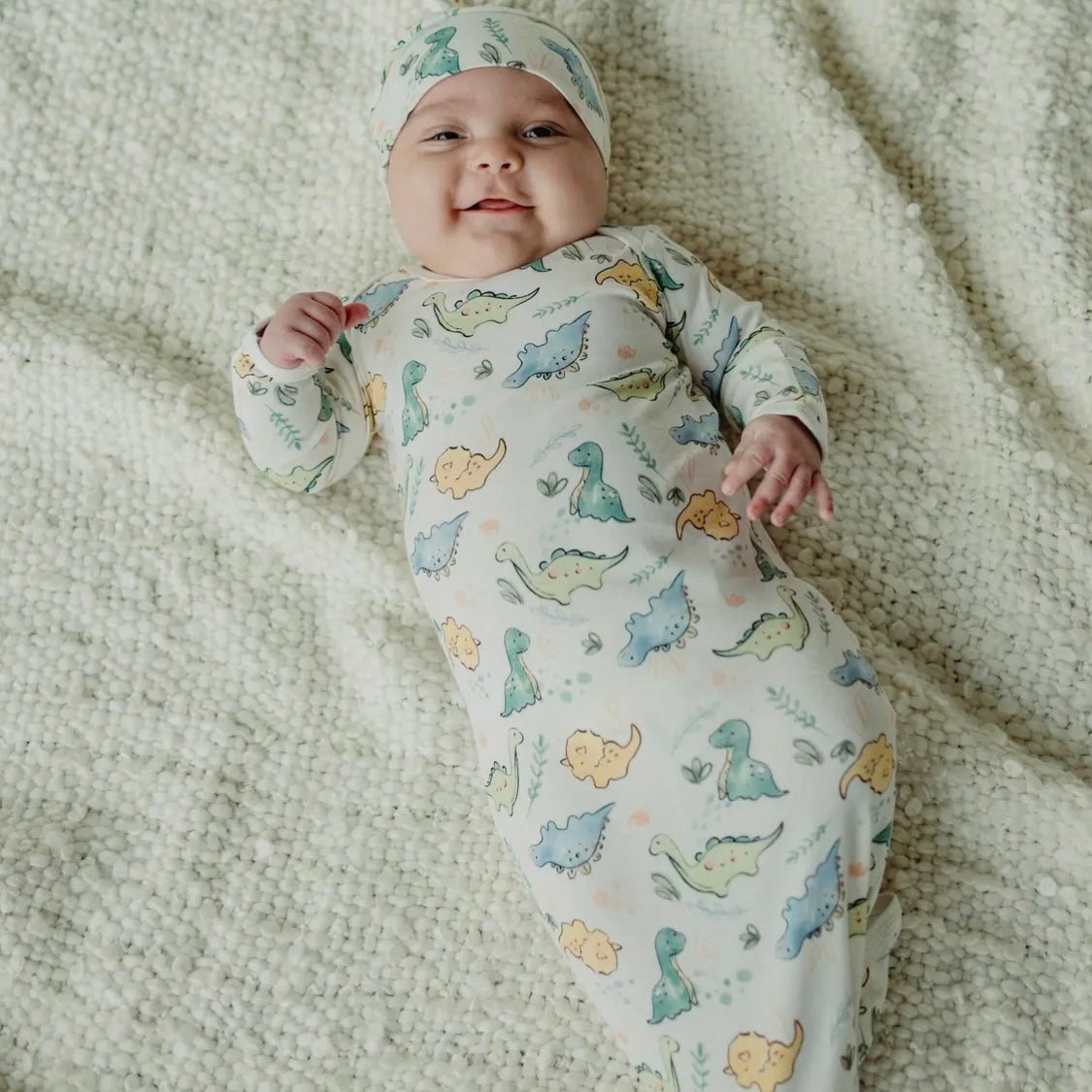 Baby in under the Nile dinosaur Organic gown and beanie