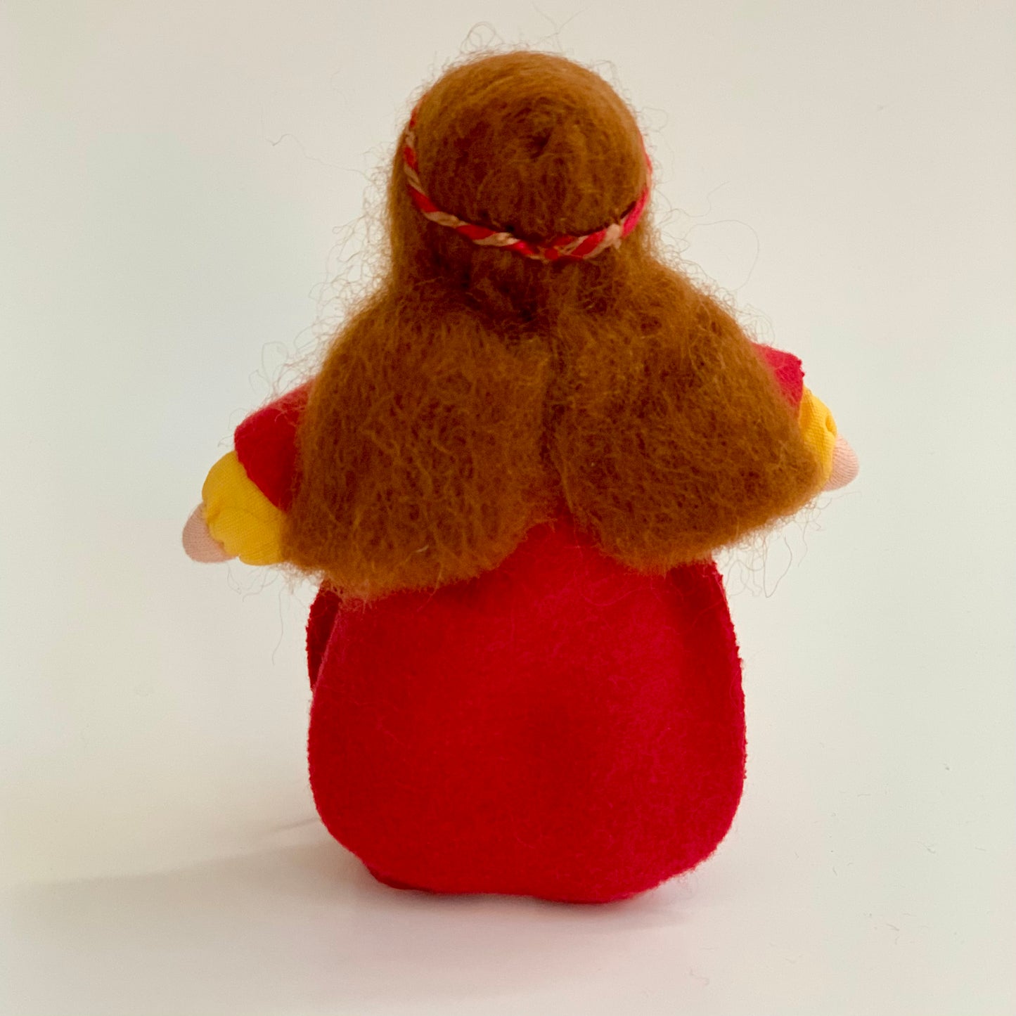 evi prince waldorf dollhouse doll from the back