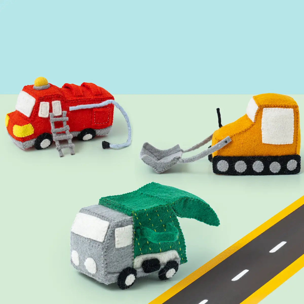 Felted toy vehicles fire engine, bulldozer, and garbage truck