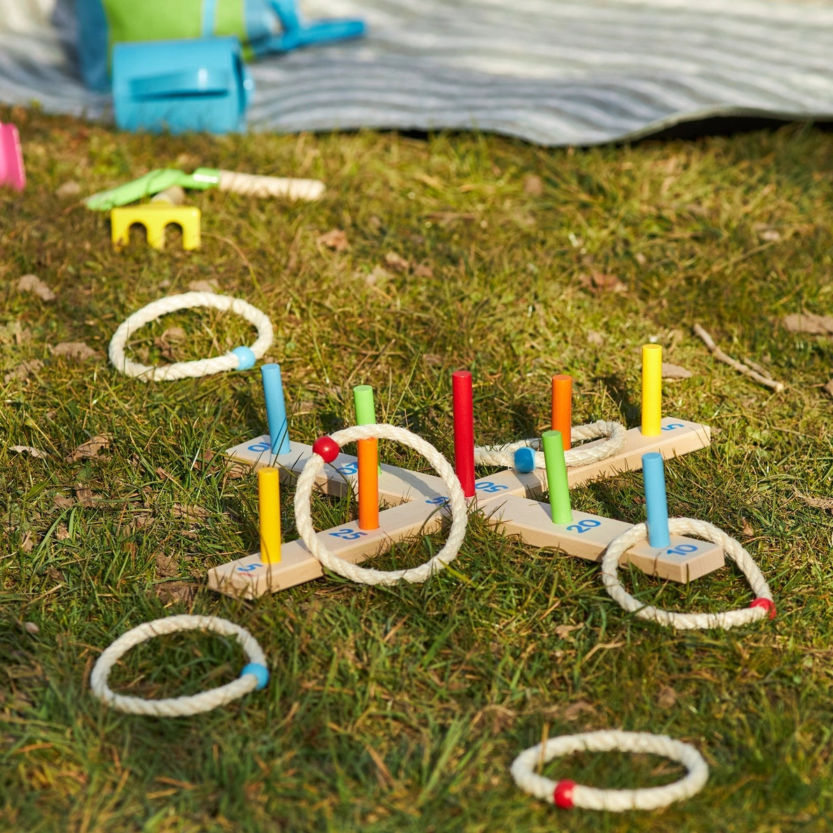 Goki outdoor wooden ring toss game set up on grass