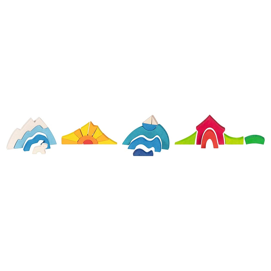 Goki colorful wooden toy building set with mountains, a sun, a sea scape and a house
