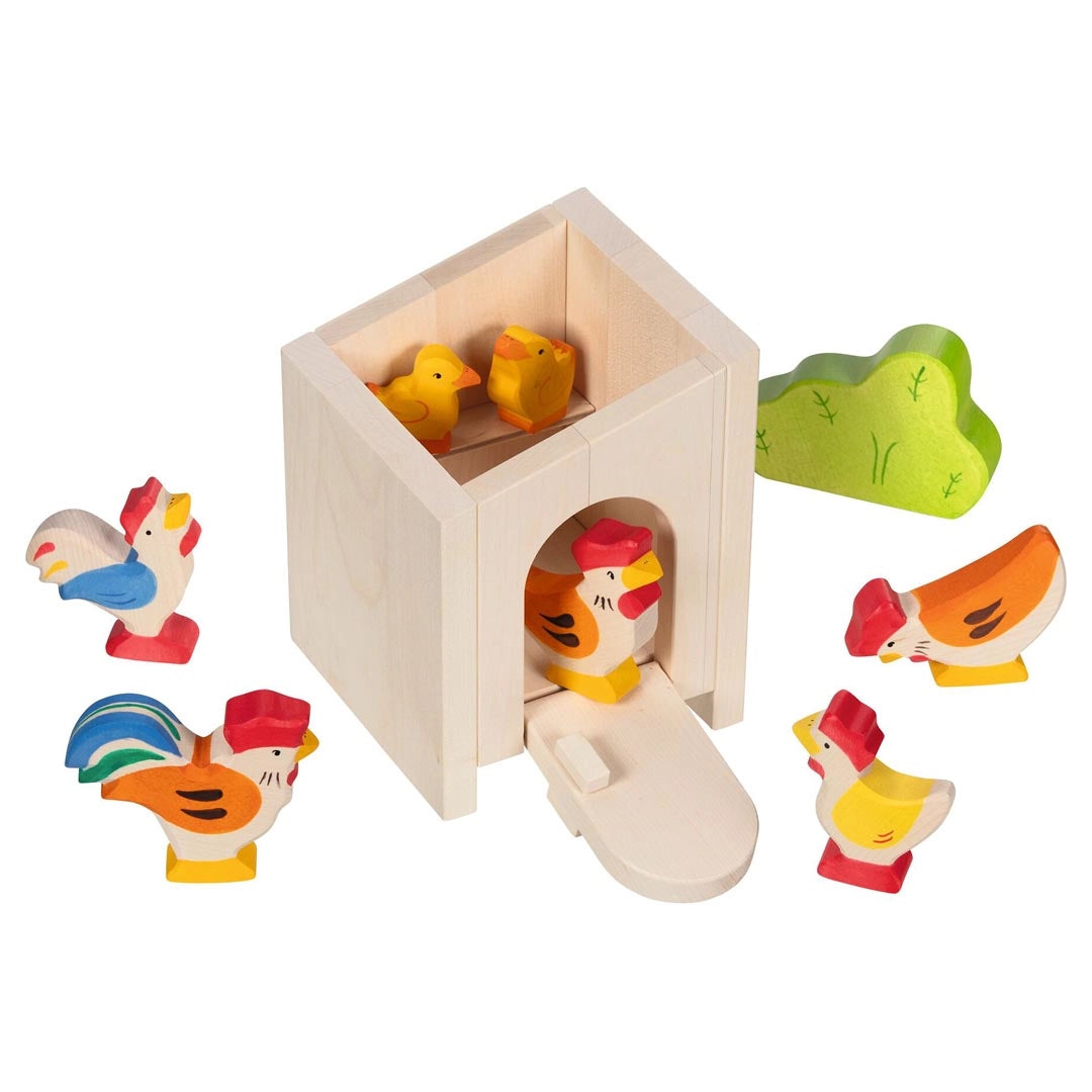 Holztiger natural wooden toy farm accessory stable with colorful chickens, hens, and chicks.