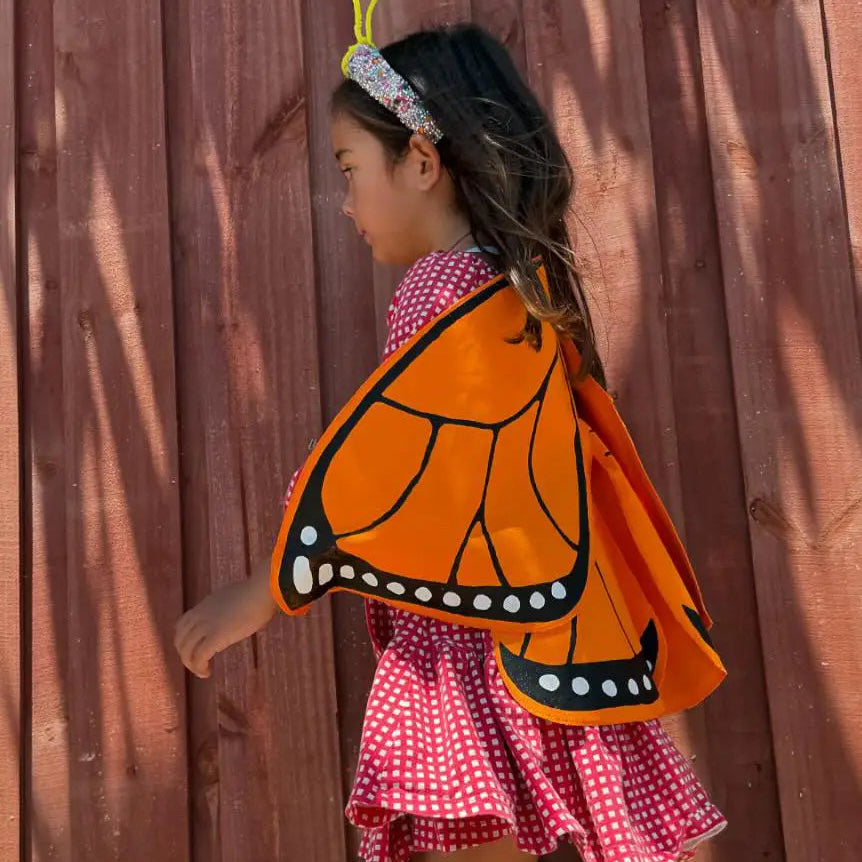 girl in monarch butterfly costume wings