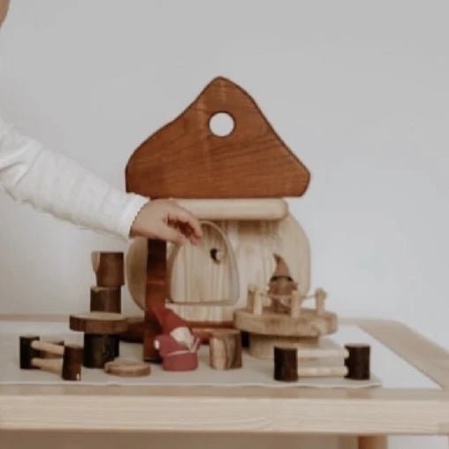 wooden mushroom house and gnomes