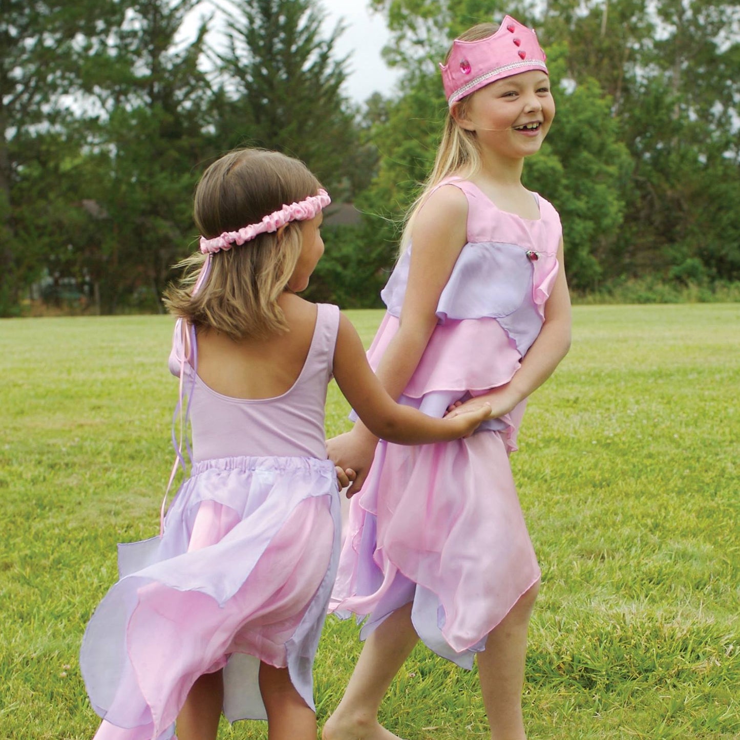 girls playing in sarah's silks fairy skirts and princess crowns.