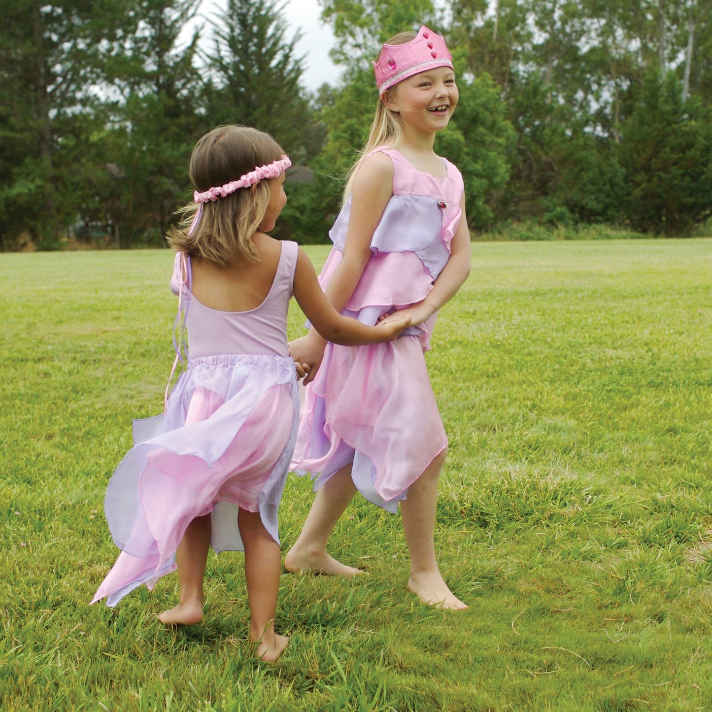 girls playing in sarah's silks princess crown and fairy skirt costumes