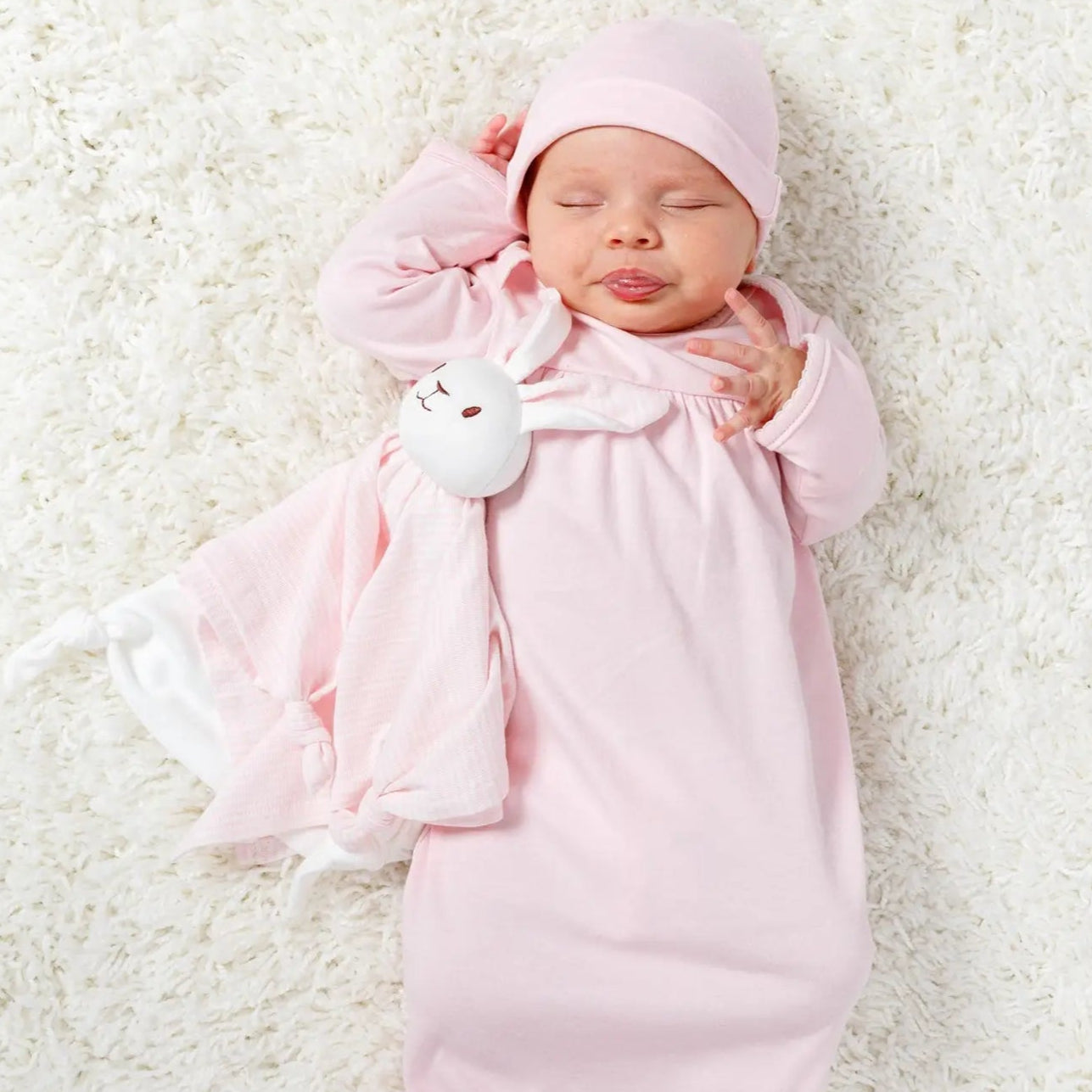 baby with under the nile organic pink bunny lovey toy