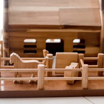 Wooden toy farm animals close