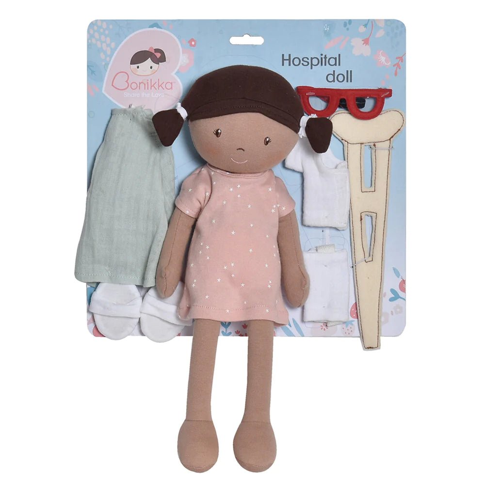 Handmade hospital rag doll with crutches and cast