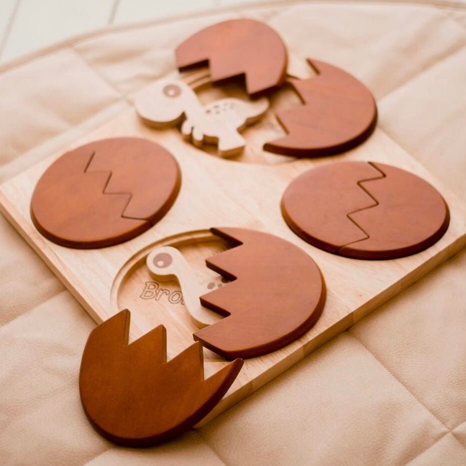 Wooden toy dinosaur hatching puzzle