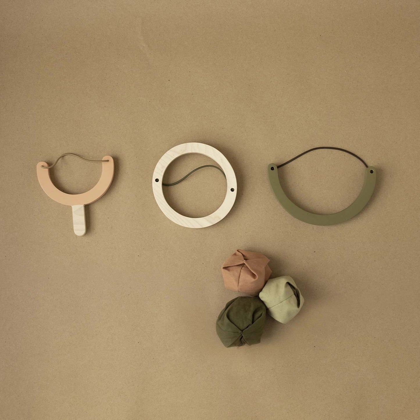 3 wooden slingshot toys