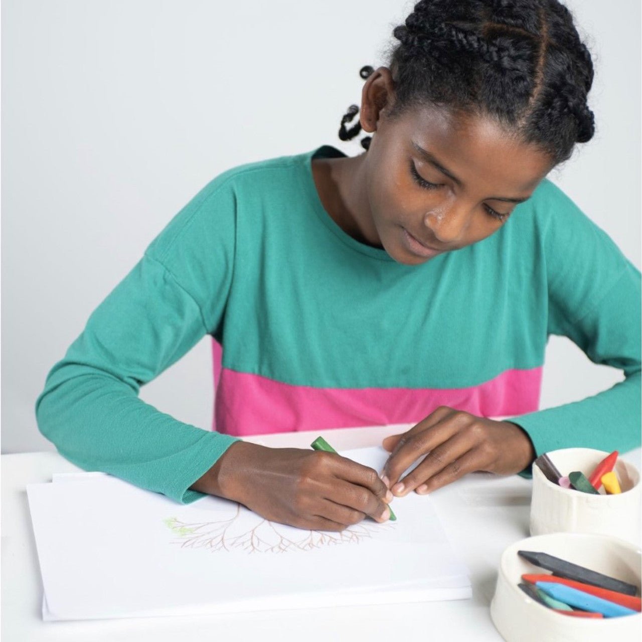 girl drawing with eco kids beeswax crayons