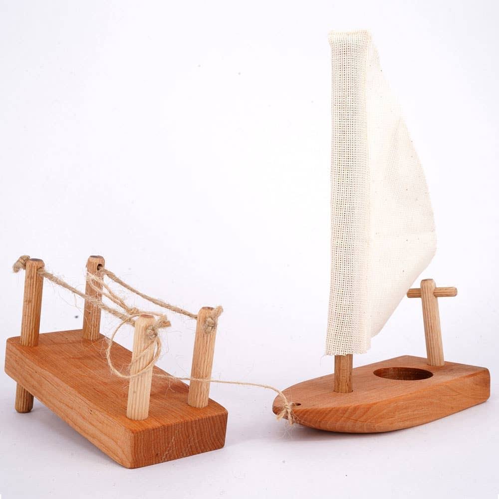 magic wood natural wooden sailboat and dock
