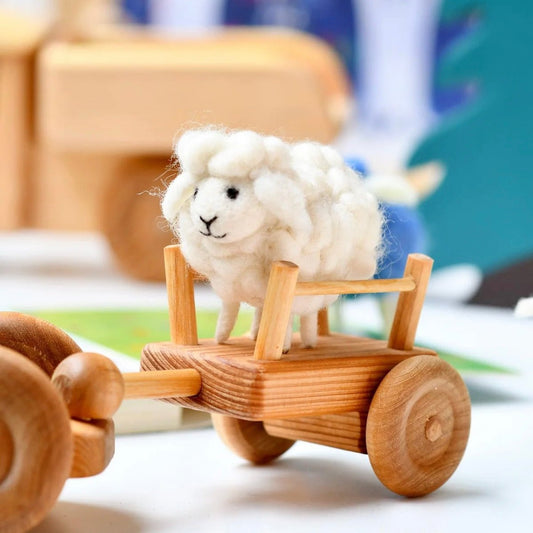 felt wooly sheep toy on cart