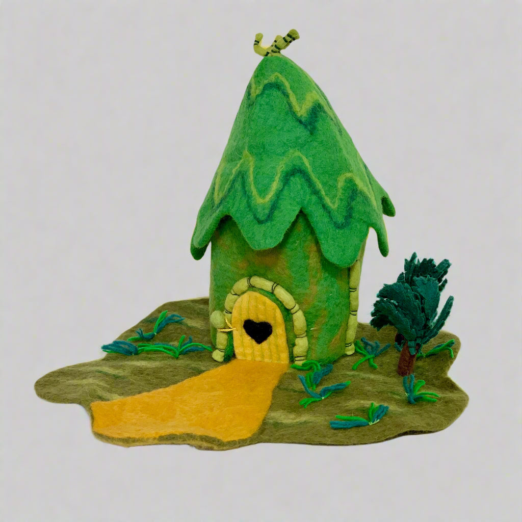 winding road felt jungle hut doll house with trees