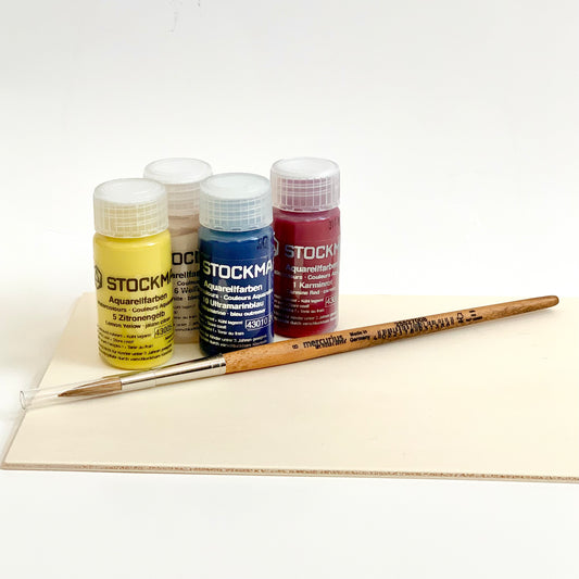 Set of Stockmar watercolor paints with a Mercurius Art Makes sense cow hair brush with a round tip