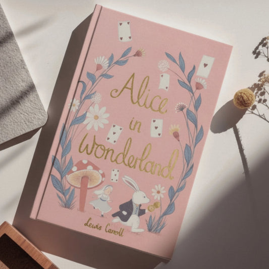 Alice in Wonderland collectors edition hardcover book with dried flowers