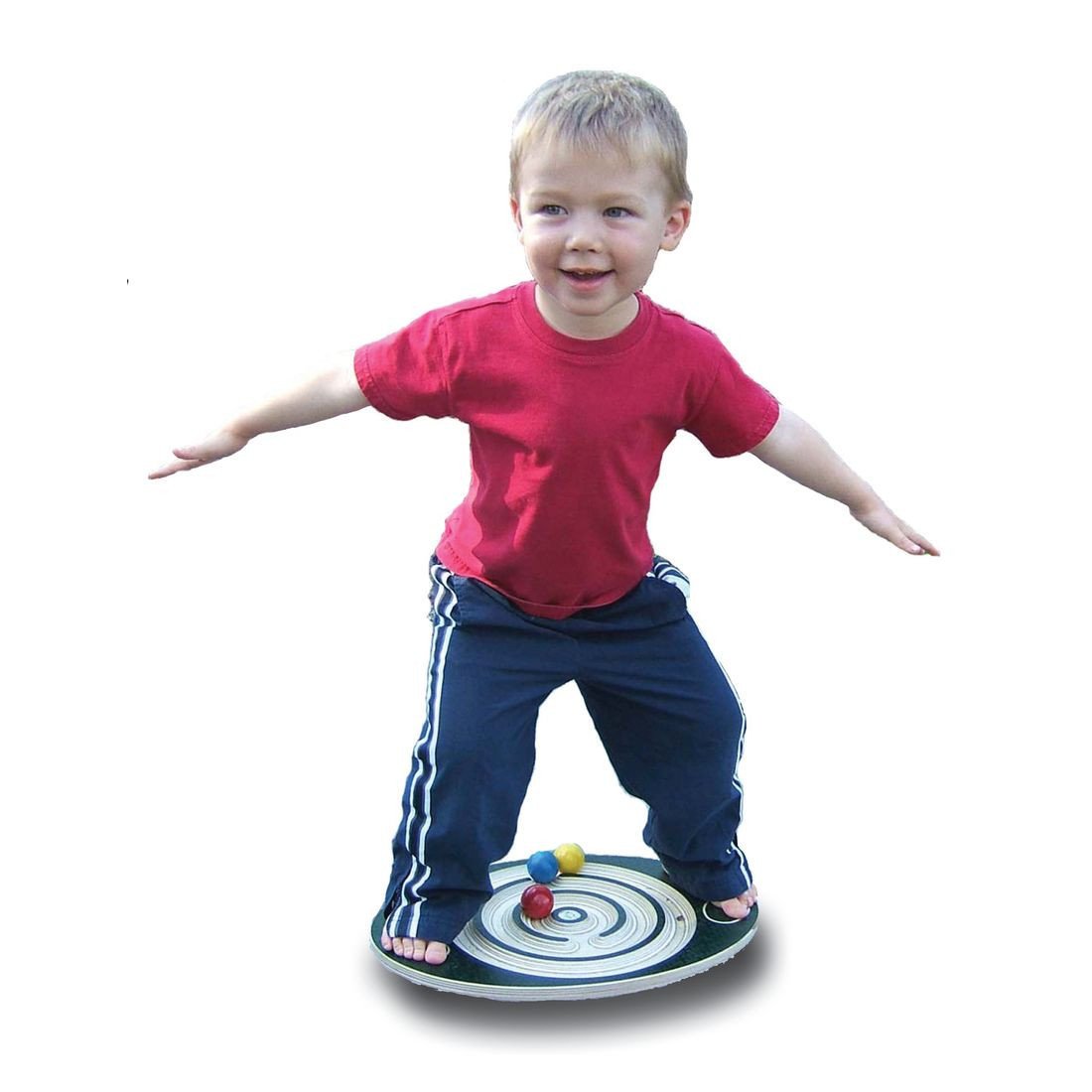 Child standing on a wooden labyrinth balance board with colorful balls