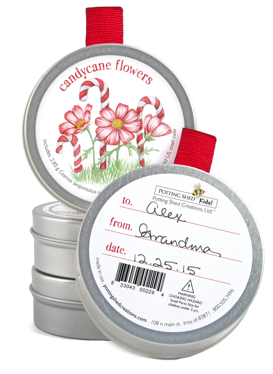Potting Shed Creations Candy cane flower seeds in a Christmas ornament tin with a tag to personalize on the back. 