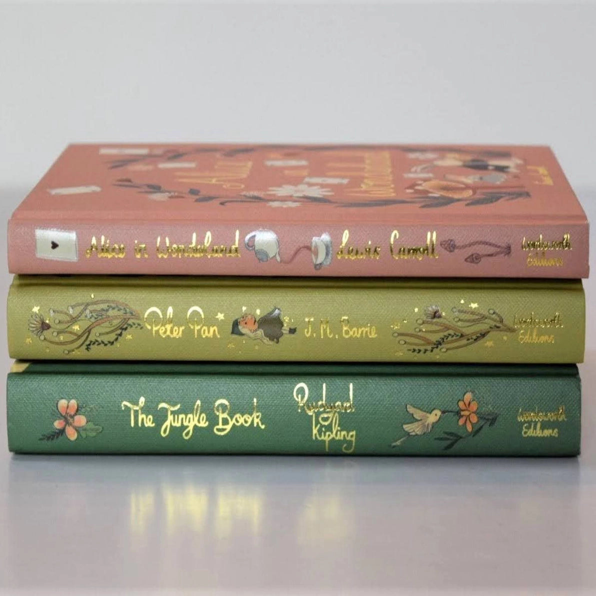 Stack of 3 children's classic books collector's editions: Alice in Wonderland, Peter Pan, The Jungle Book