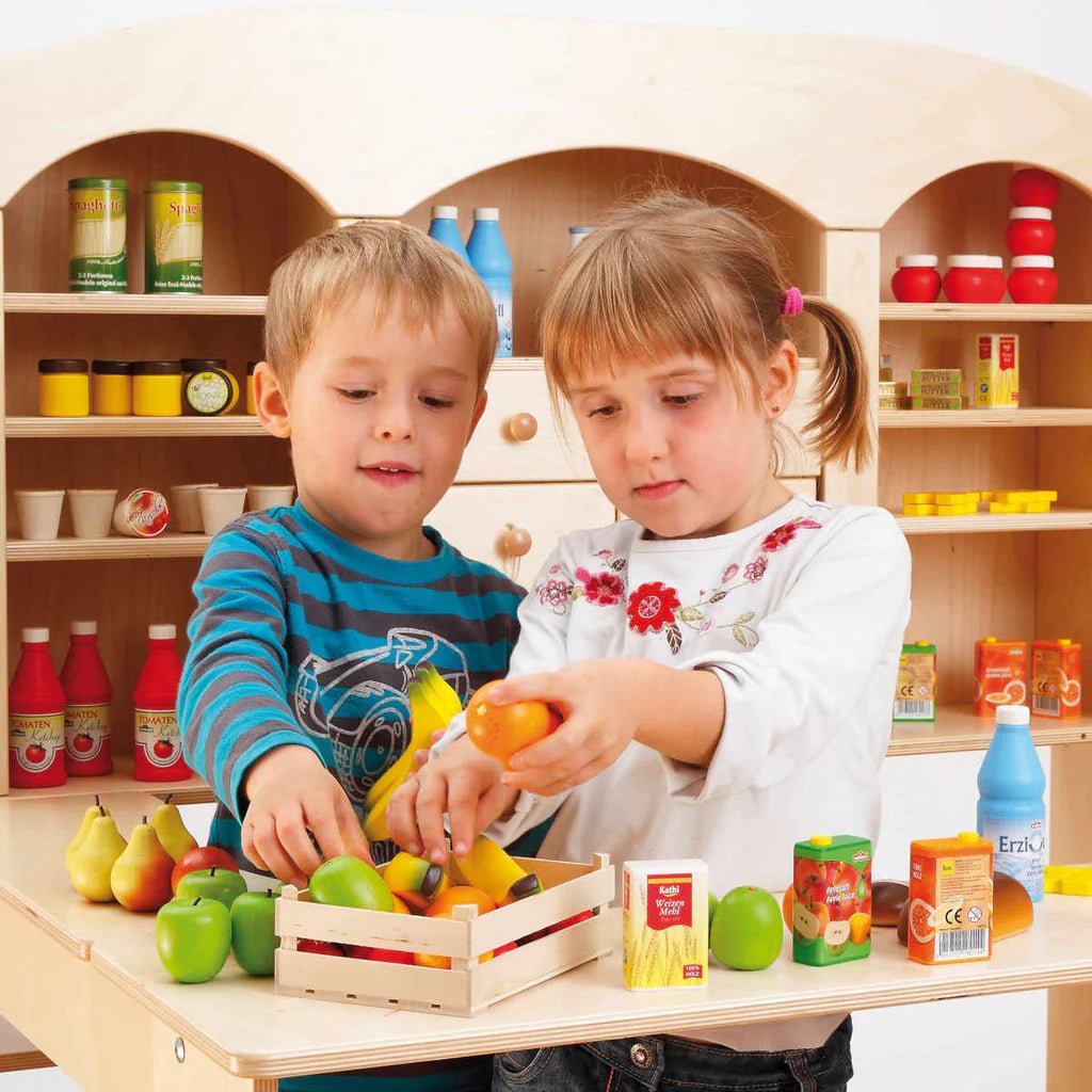 kids play market with Erzi wooden fruit