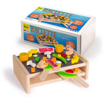 Wooden toy raclette grill set with colorful play food pieces and a box in the background