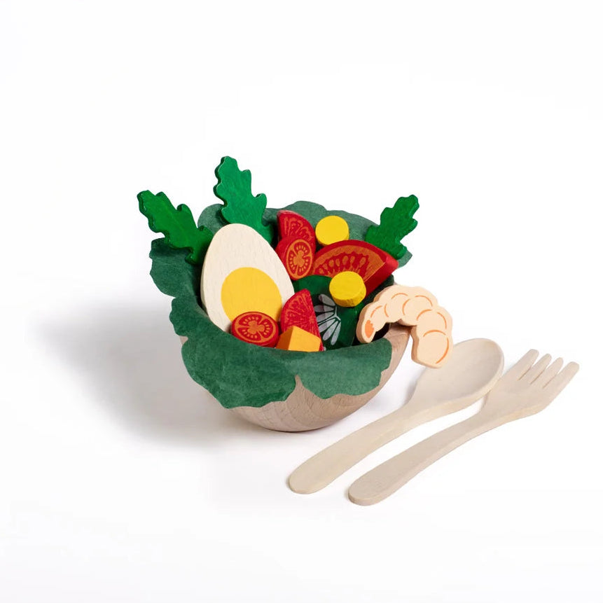 Erzi toys wooden play food salad set with a bowl, spoon, fork, vegetables, and  a boiled egg.