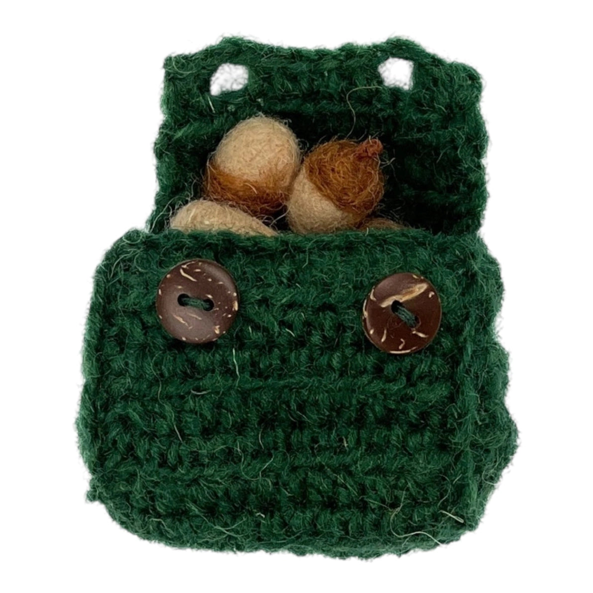 Green knitted miniature backpack with mushrooms and acorns