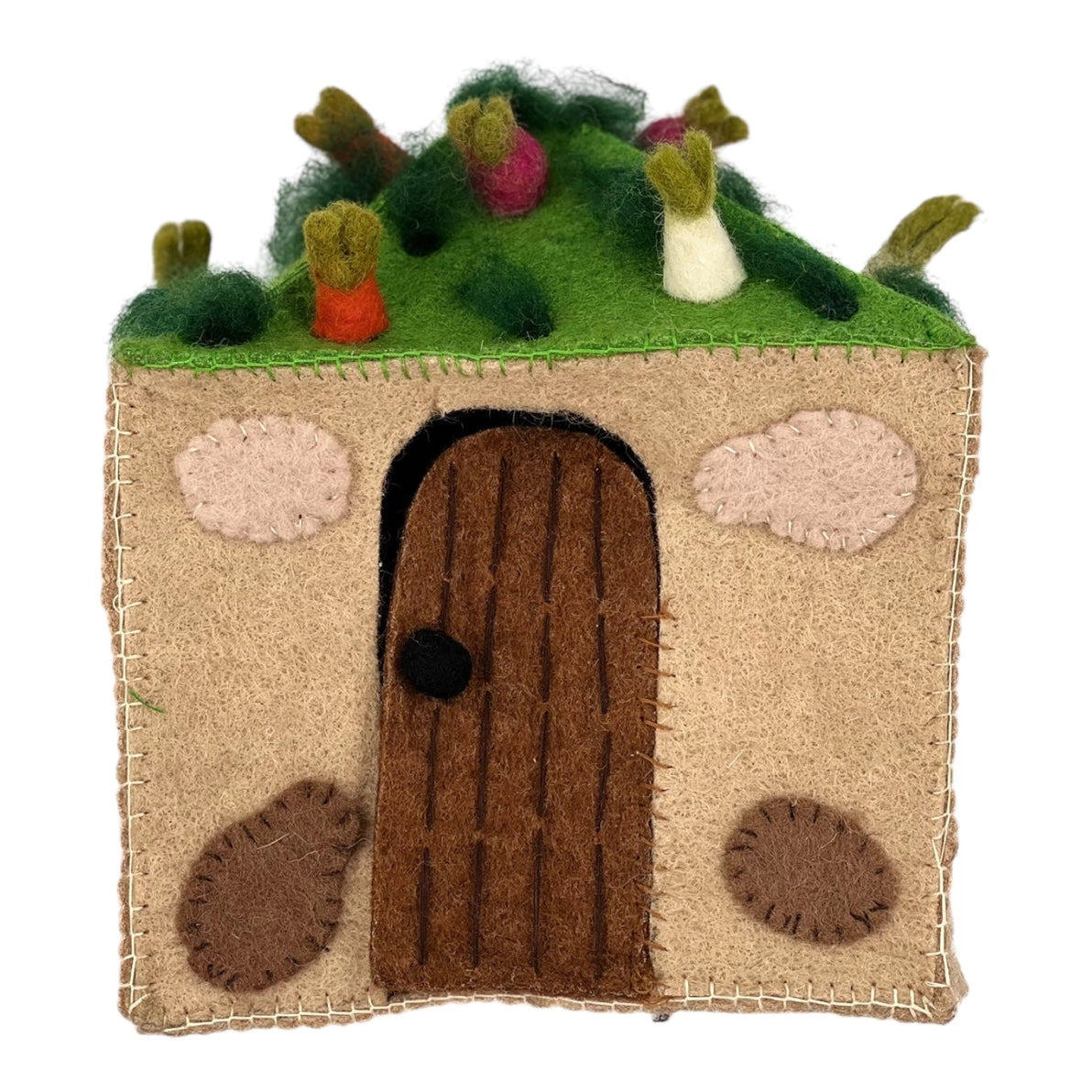 Felt cottage house with a door and veggies on the roof