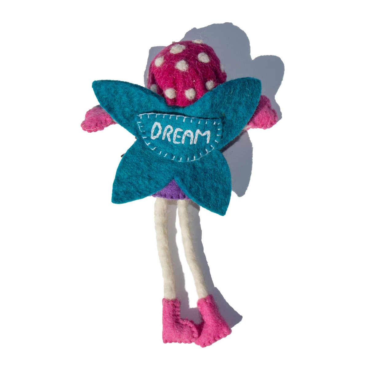 Toy fairy doll with Dream embroidered on blue wings.