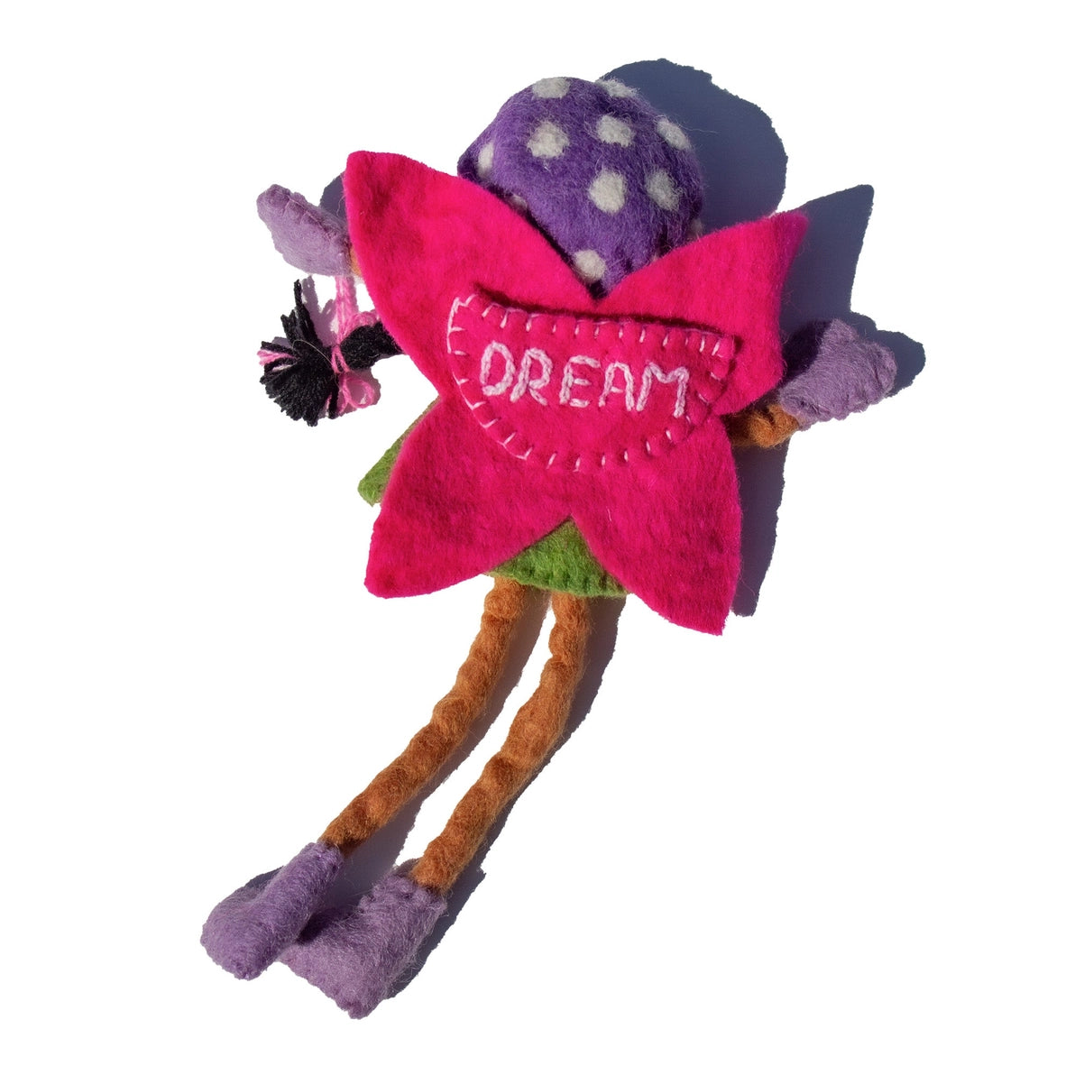 Felt tooth fairy doll with brown skin and black hair with a pocket for a child's tooth on her wings.