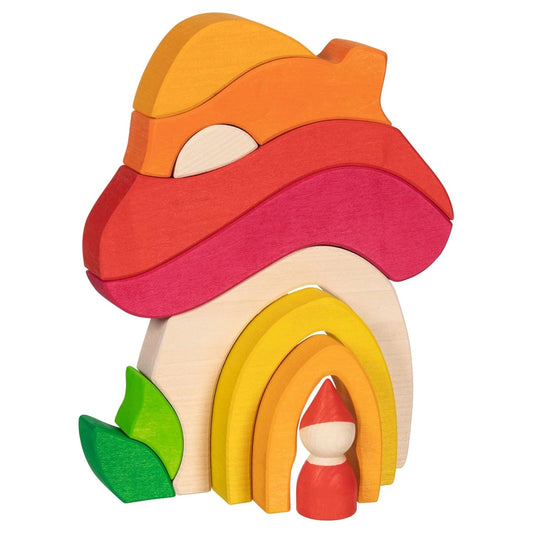 Gokid evolution colorful wooden building blocks forming a mushroom house with a small gnome figure.