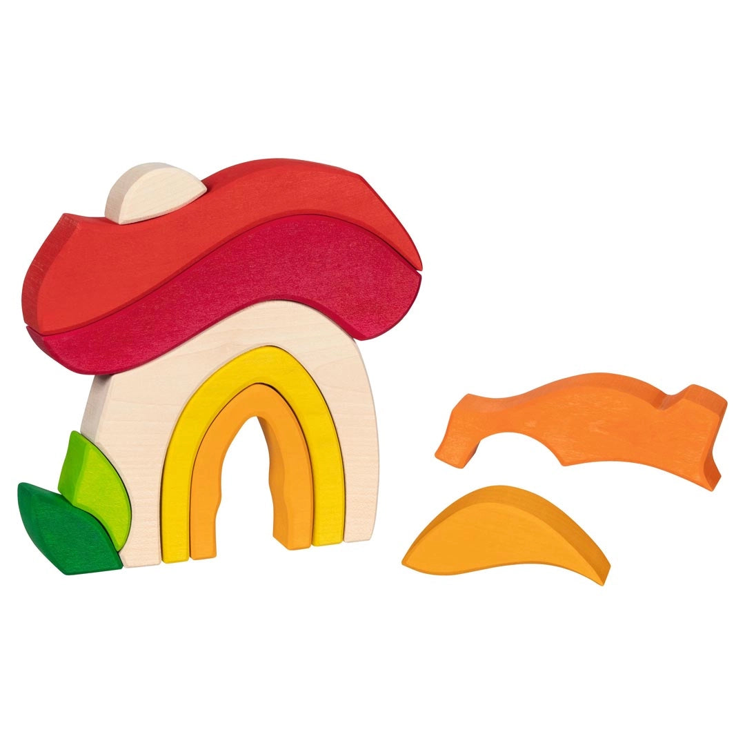 Goki evolution wooden toy building blocks forming a house with a red roof