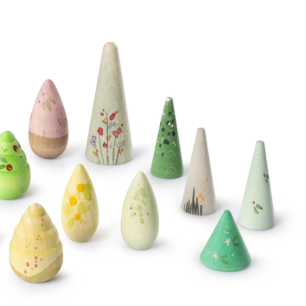 close up of 10 grapat hand painted wooden toy trees