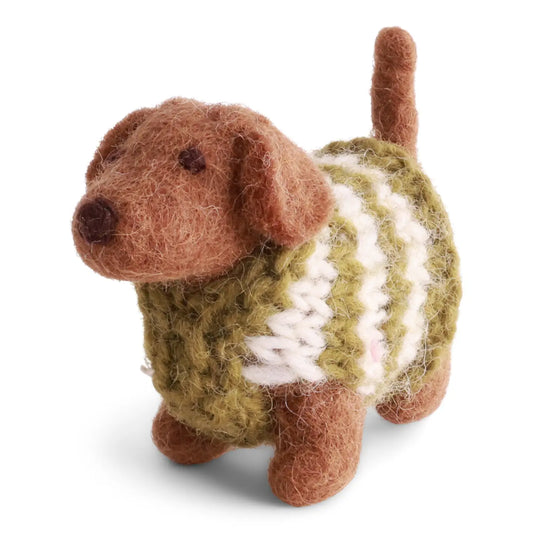 A felted wool dog toy wearing a knitted sweater in olive green and white.