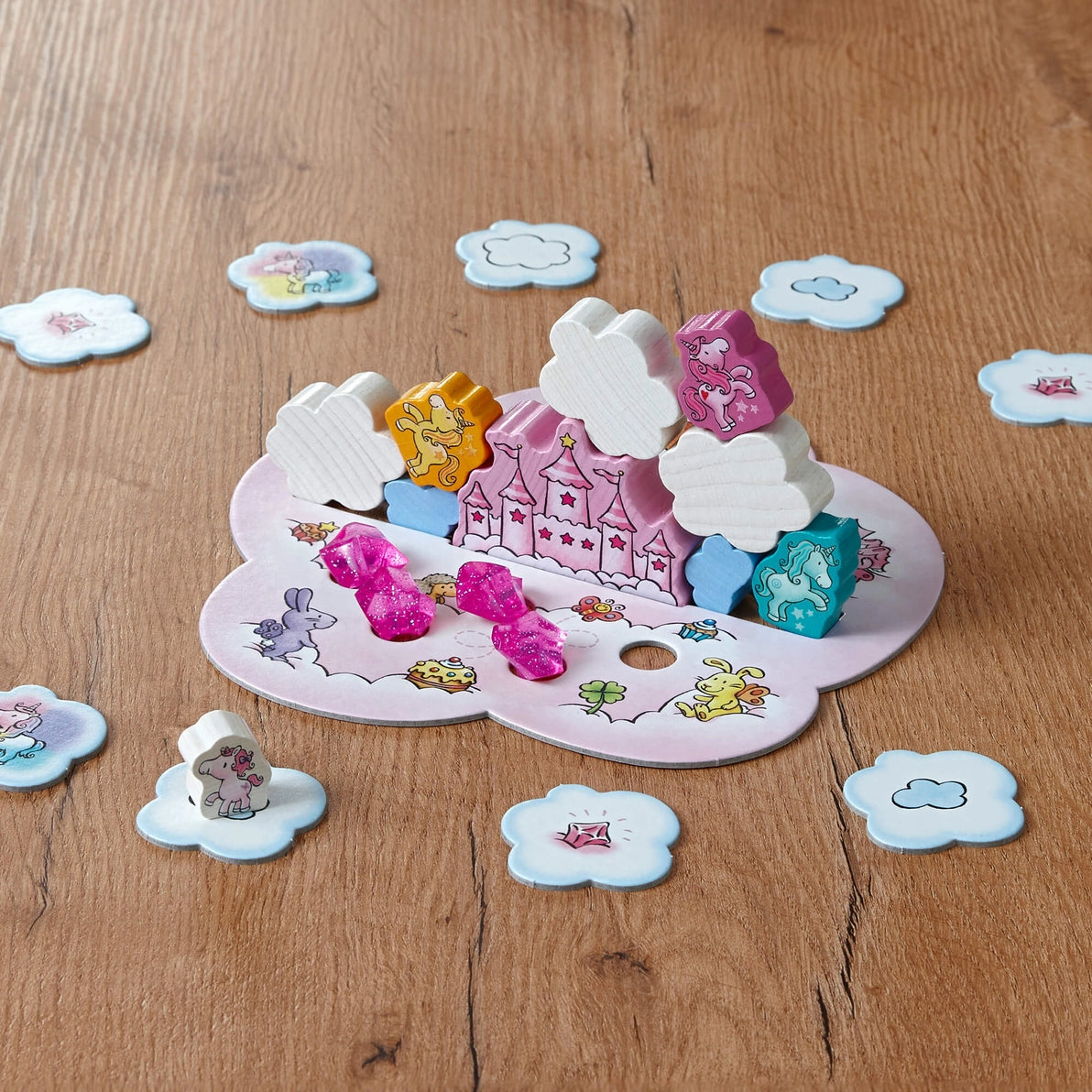 Haba Unicorn Glitterluck children's board game with castle, clouds and crystals playing pieces. 
