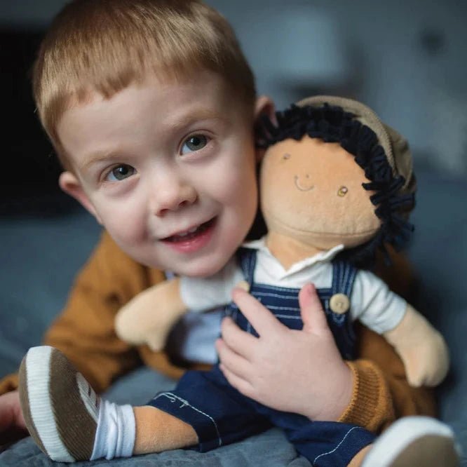 boy with handmade soft doll