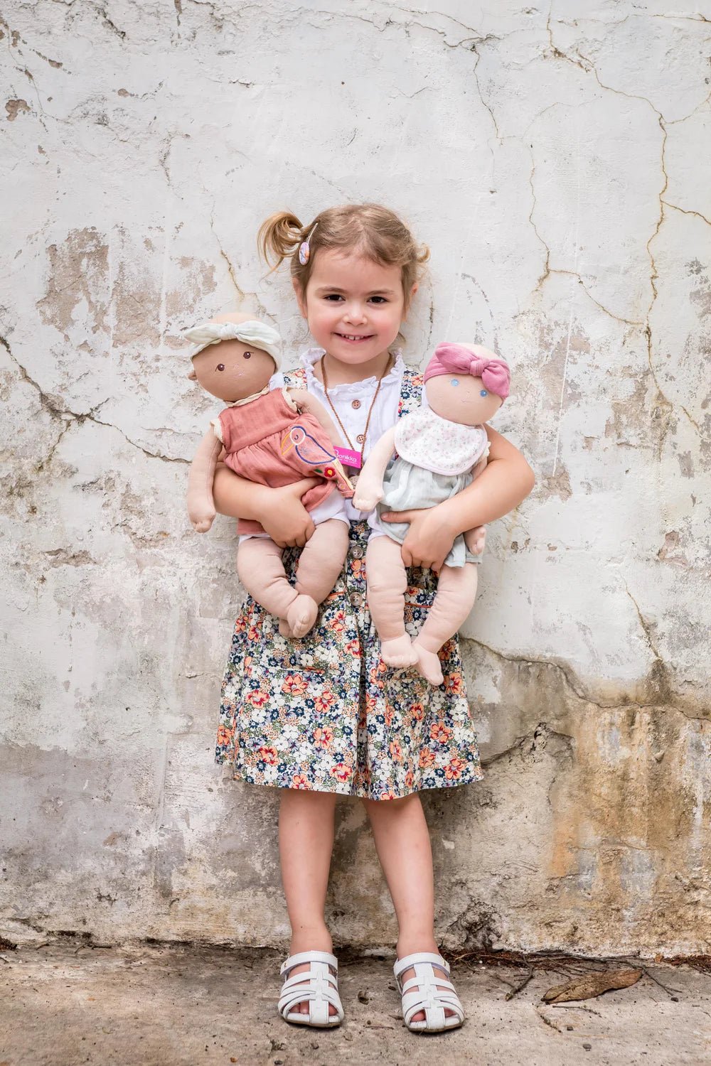 girl holding organic bonikka dolls