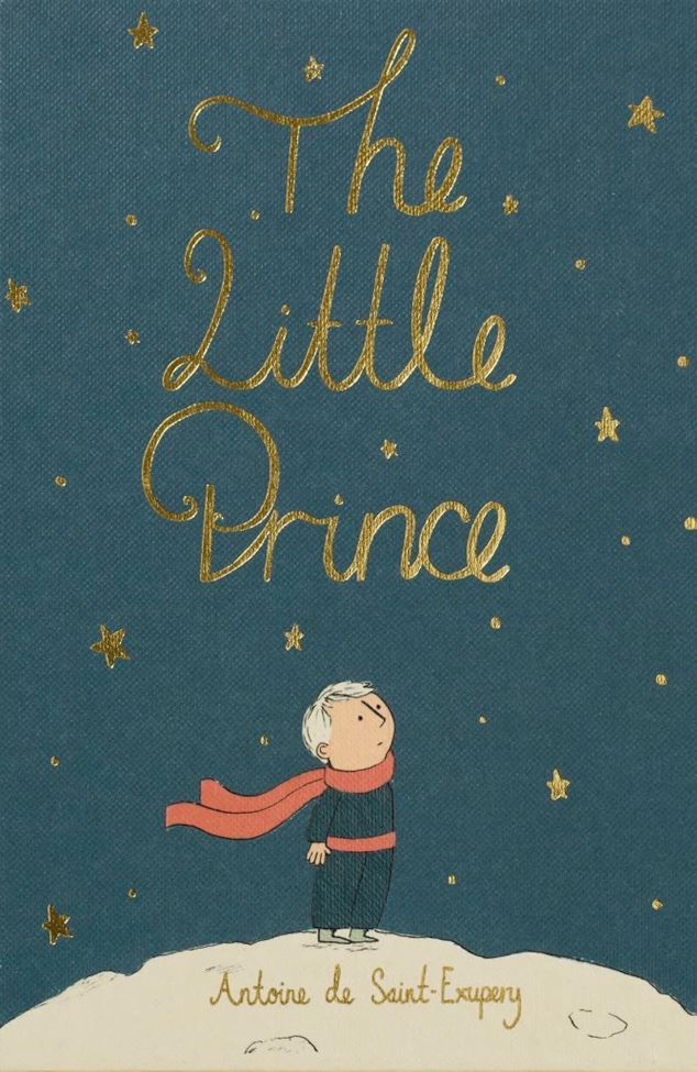 Hardcover Collector's Edition classic 'The Little Prince' with a prince and gold lettering and stars stars on a blue background