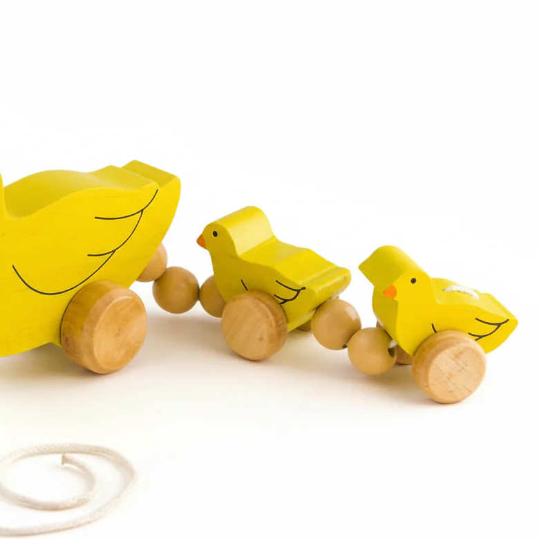 Wooden pull toy duck with baby ducks.  