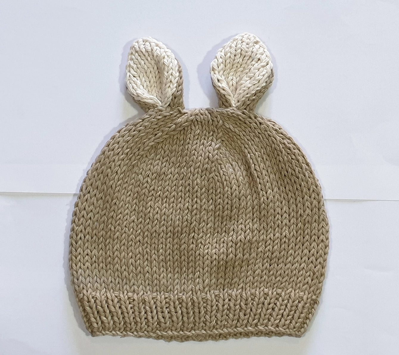 Organic hand knit beige baby and toddler hat with bunny ears