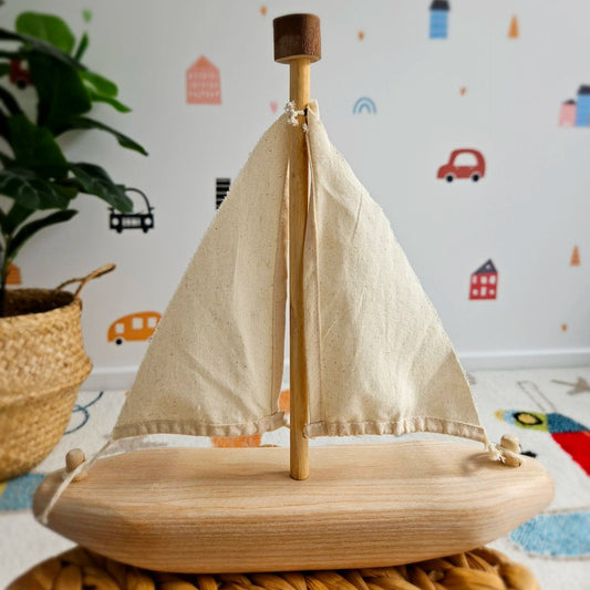 qtoys eco-friendly wooden recycled tree sailboat toy with canvas sail