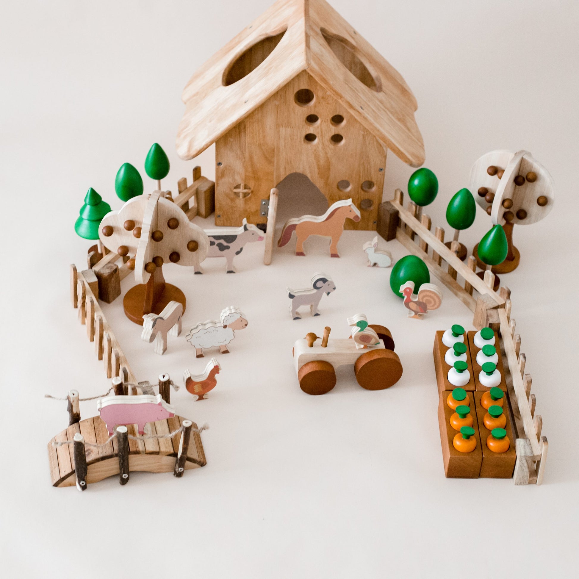 Qtoys wooden toy farm set with animals, trees, fences, vegetables, and a barn 