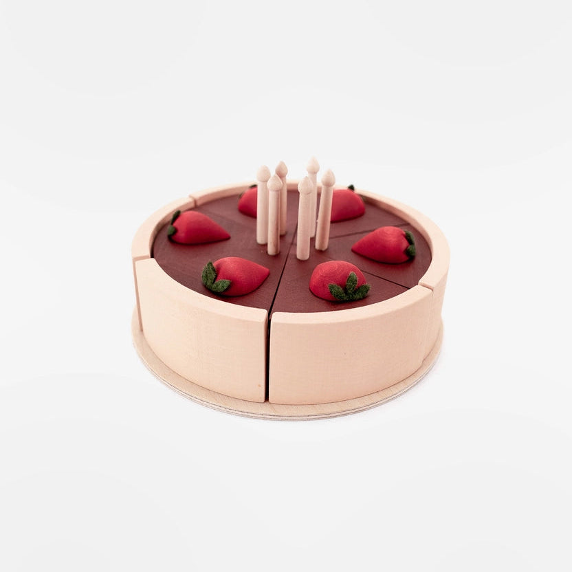 Sabo concept play food chocolate layered birthday cake toy with red strawberry decorations, and white candles.