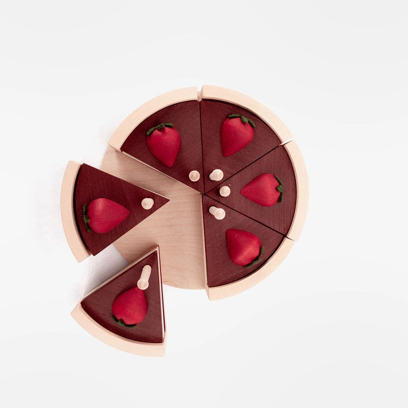 Sabo Concept wooden chocolate cake toy with mix and match layered slices, decorated with strawberries and birthday candles. 